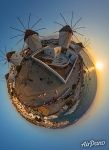 Mykonos windmills at sunset. Planet